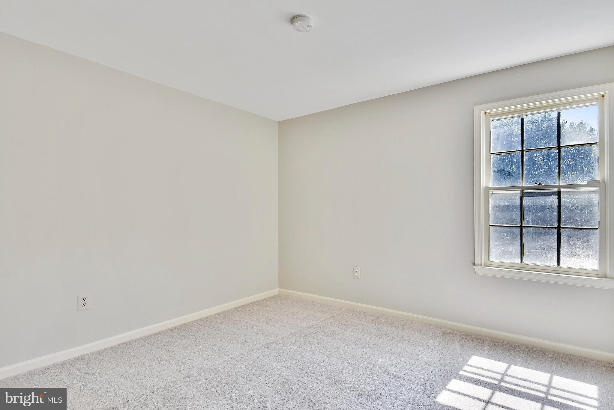 1026 Riva Ridge Drive Great Falls, VA 22066 - Photo 23 of 30 a view of an empty room with a window