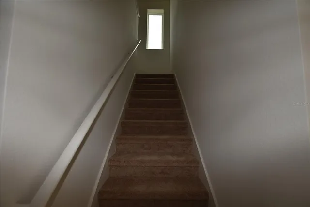 a view of a window in an empty room