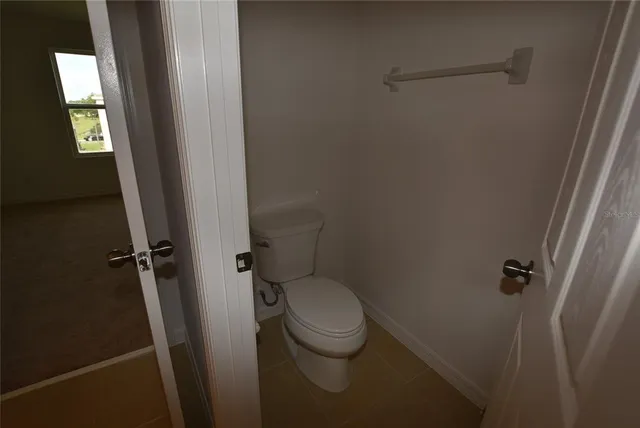 a view of hallway with closet