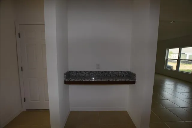 a view of storage and utility room