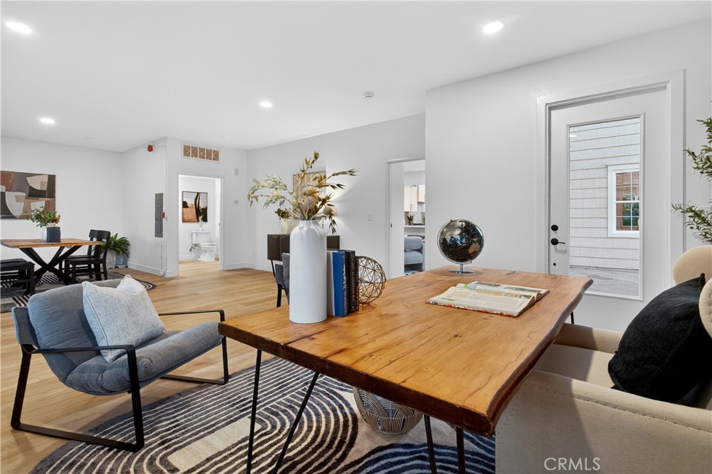 81 Zinnia Street Ladera Ranch, CA 92694 - Photo 36 of 47 a living room with furniture and wooden floor