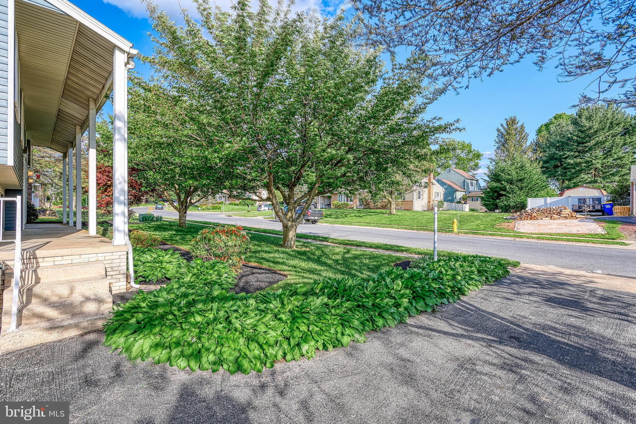 2285 Esbenshade Road York, PA 17408 - Photo 11 of 41 a view of a garden with a bench