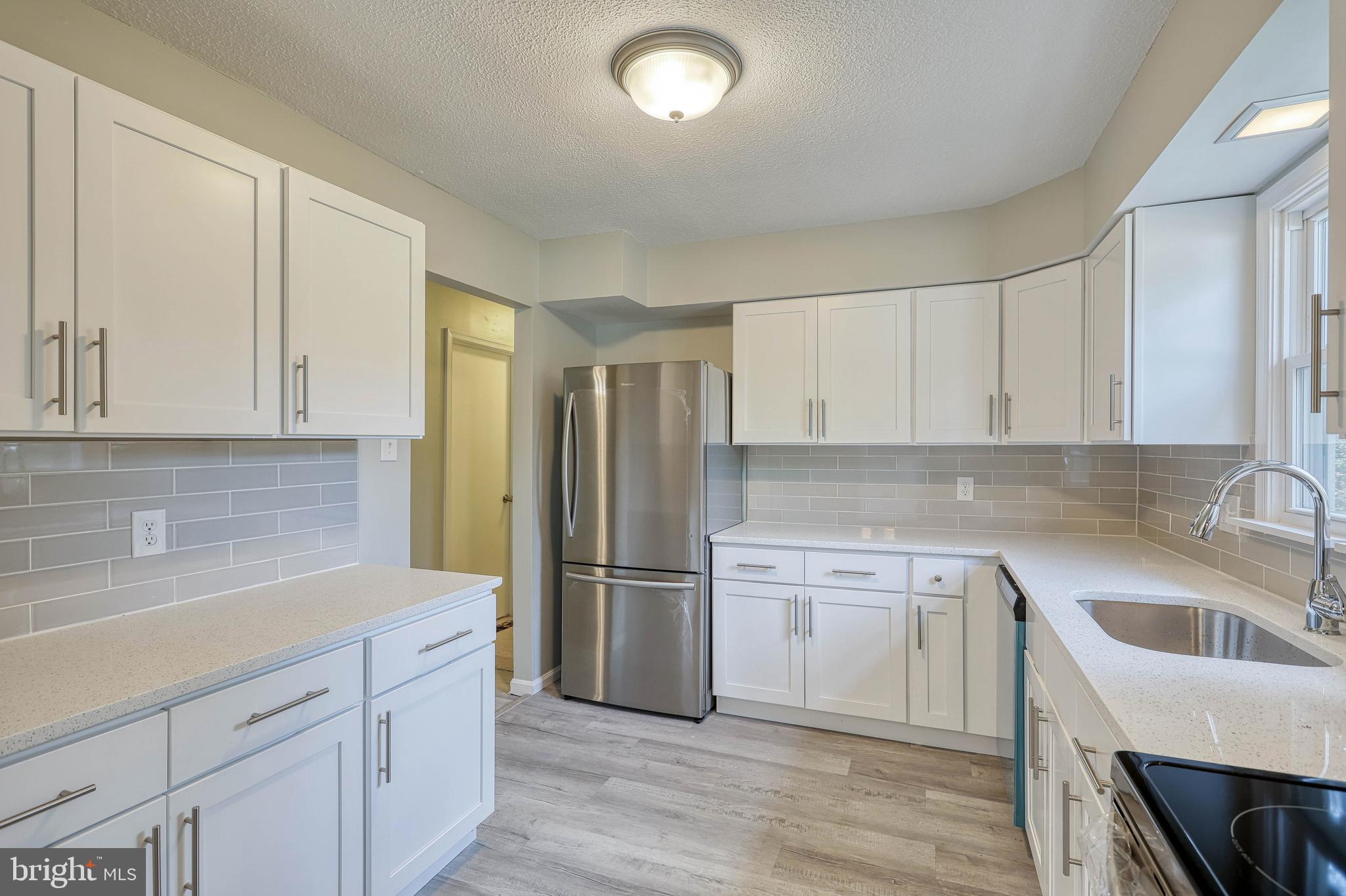 2285 Esbenshade Road York, PA 17408 - Photo 21 of 41 a kitchen with a sink cabinets and stainless steel appliances