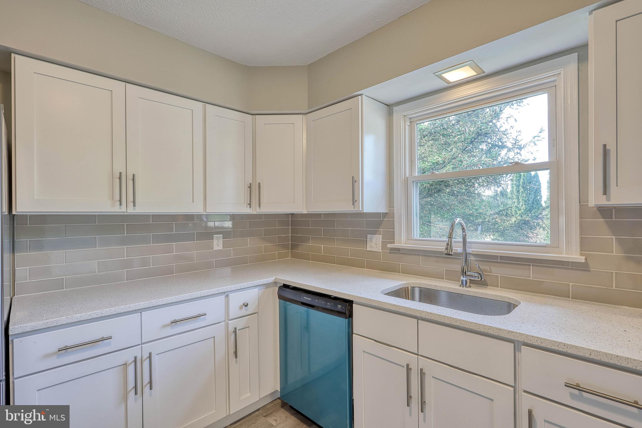 2285 Esbenshade Road York, PA 17408 - Photo 25 of 41 a kitchen with a sink and cabinets