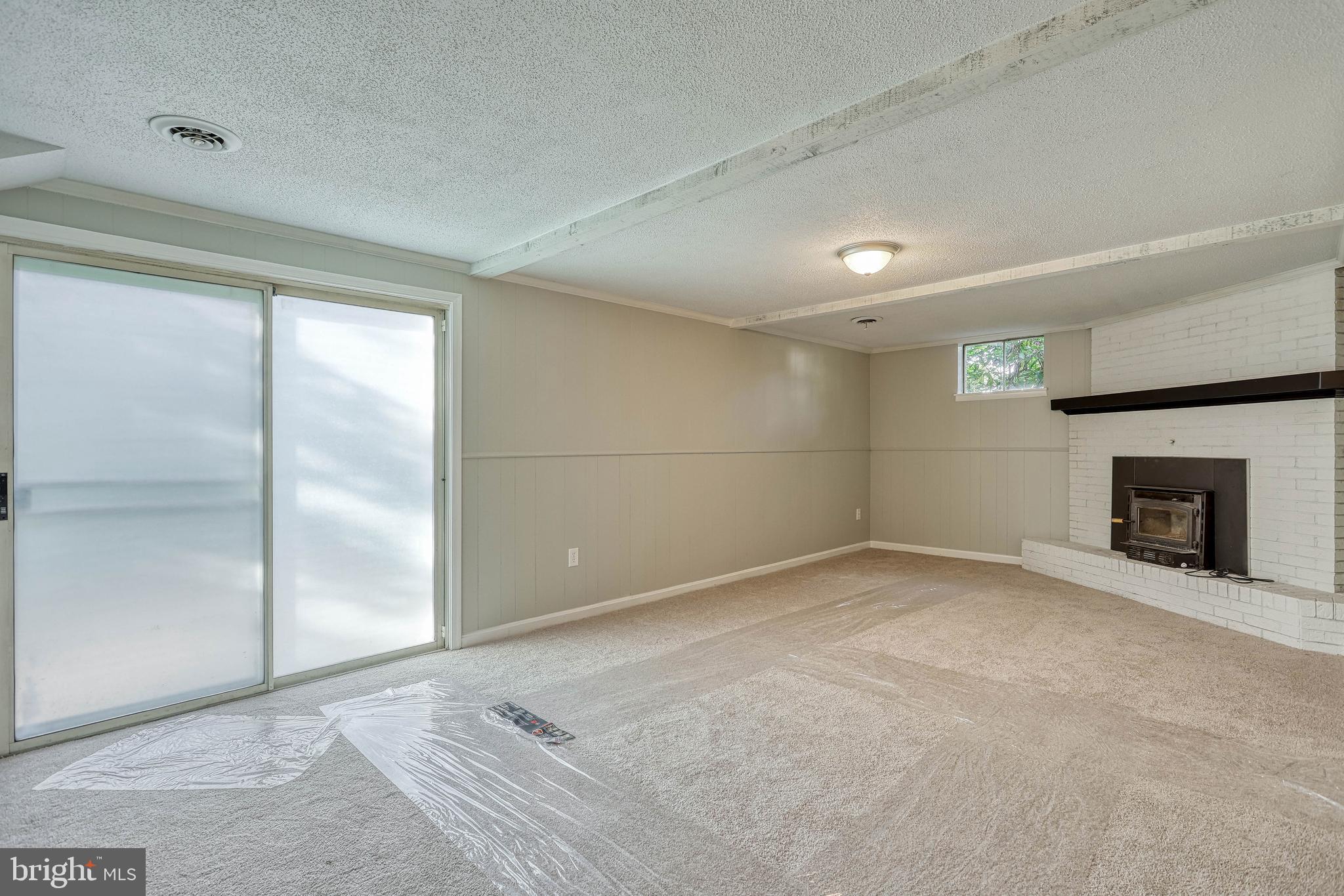 2285 Esbenshade Road York, PA 17408 - Photo 32 of 41 a view of empty room with a fireplace