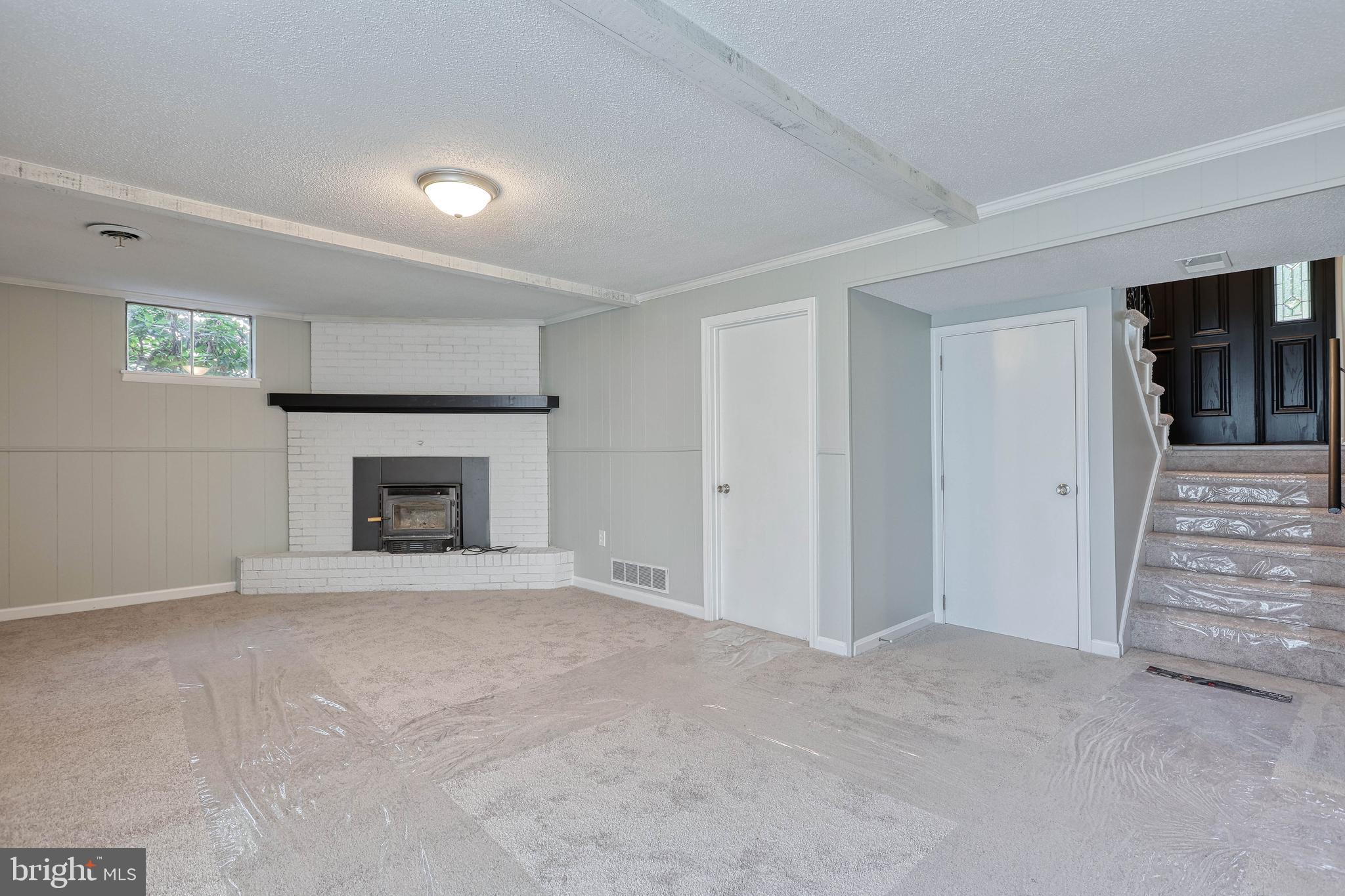 2285 Esbenshade Road York, PA 17408 - Photo 33 of 41 a view of an empty room with fire place