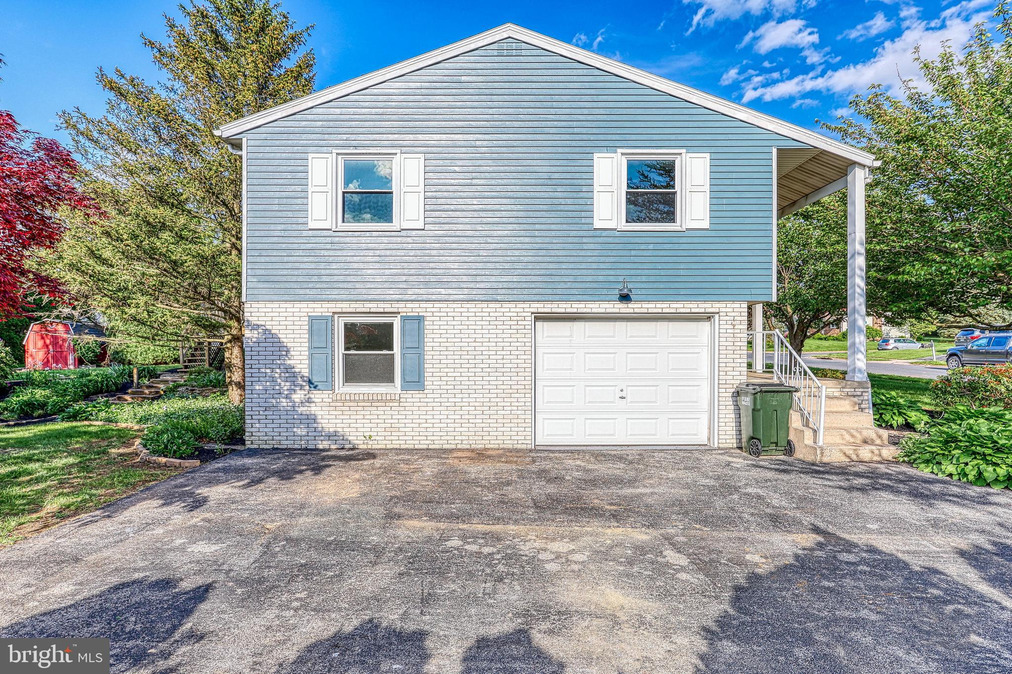 2285 Esbenshade Road York, PA 17408 - Photo 6 of 41 a view of a house with a yard and garage