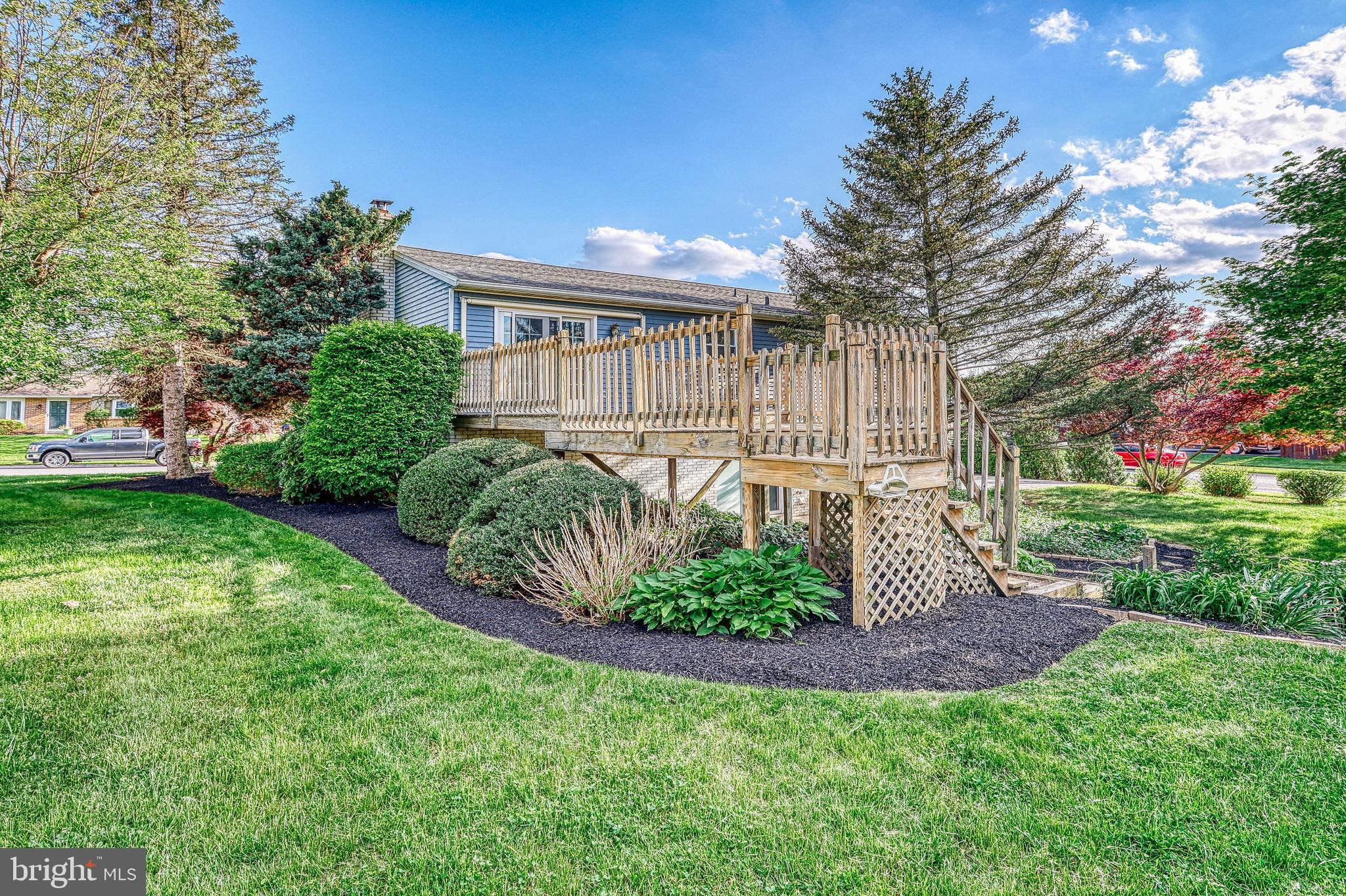 2285 Esbenshade Road York, PA 17408 - Photo 10 of 41 a view of a backyard with table and chairs plants and trees