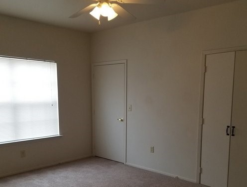 248 Old Osage Road Gatesville, TX 76528 - Photo 8 of 10 an empty room with windows