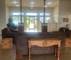 a kitchen with granite countertop a stove and a sink