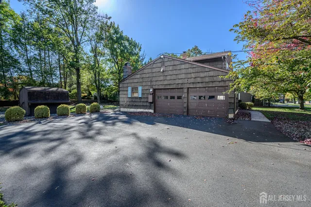 an aerial view of house with yard