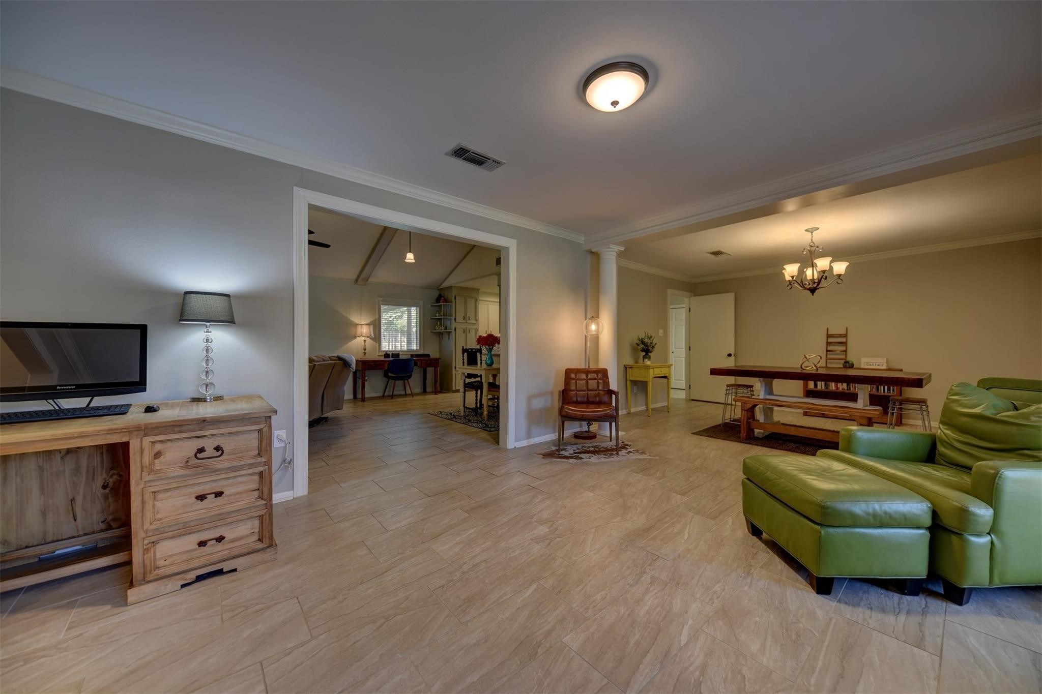 2107 Timber Lane Conroe, TX 77301 - Photo 5 of 12 a living room with furniture and a flat screen tv