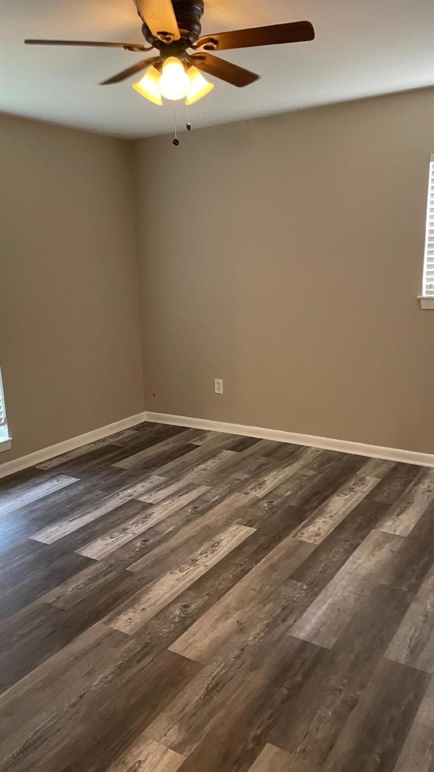 2107 Timber Lane Conroe, TX 77301 - Photo 9 of 12 a view of a room with an empty space