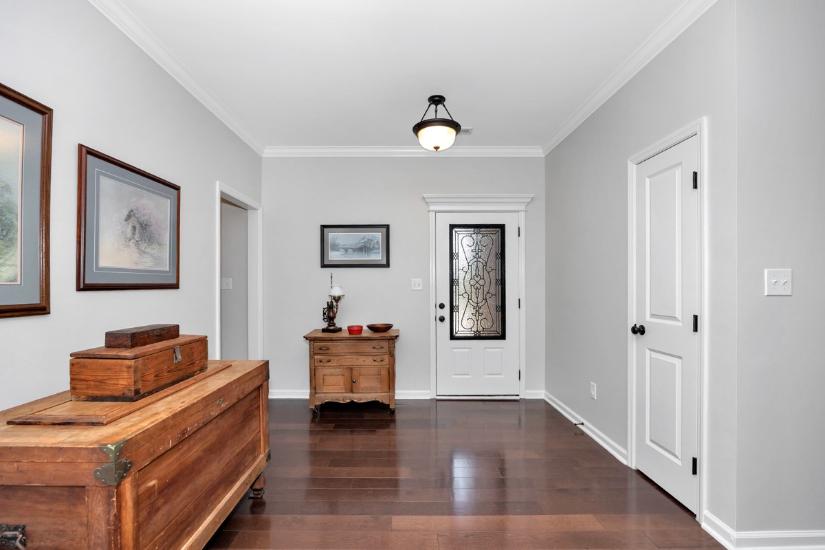 14469 Turnberry Lane Athens, AL 35613 - Photo 2 of 33 a view of living room with furniture and wooden floor
