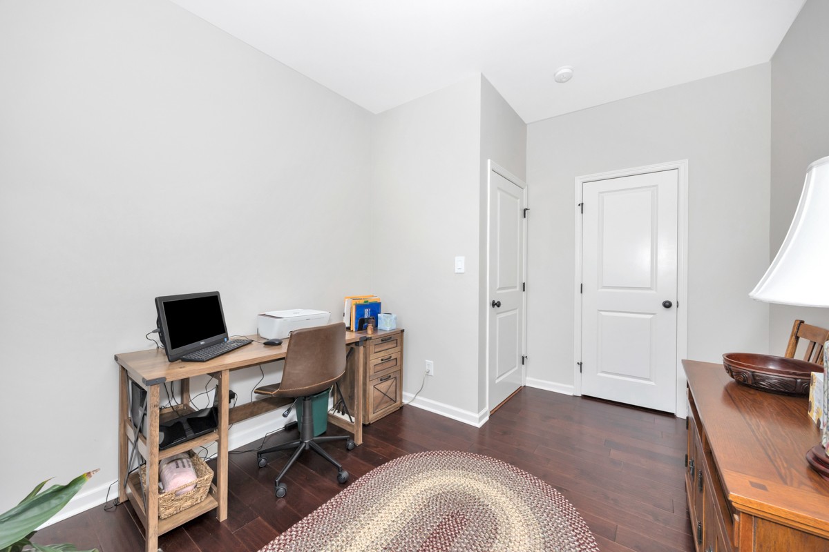14469 Turnberry Lane Athens, AL 35613 - Photo 22 of 33 a view of a workspace with furniture and a window