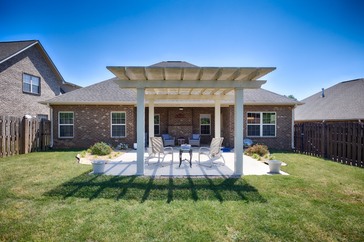 14469 Turnberry Lane Athens, AL 35613 - Photo 32 of 33 a view of a house with a yard and sitting area