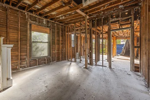 a view of an empty room with a balcony