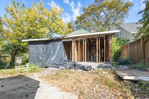 a backyard of a house with lots of green space