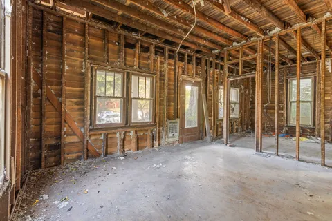 a view of an empty room with a sliding door
