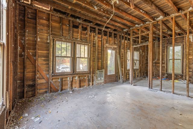 a view of an empty room with a sliding door