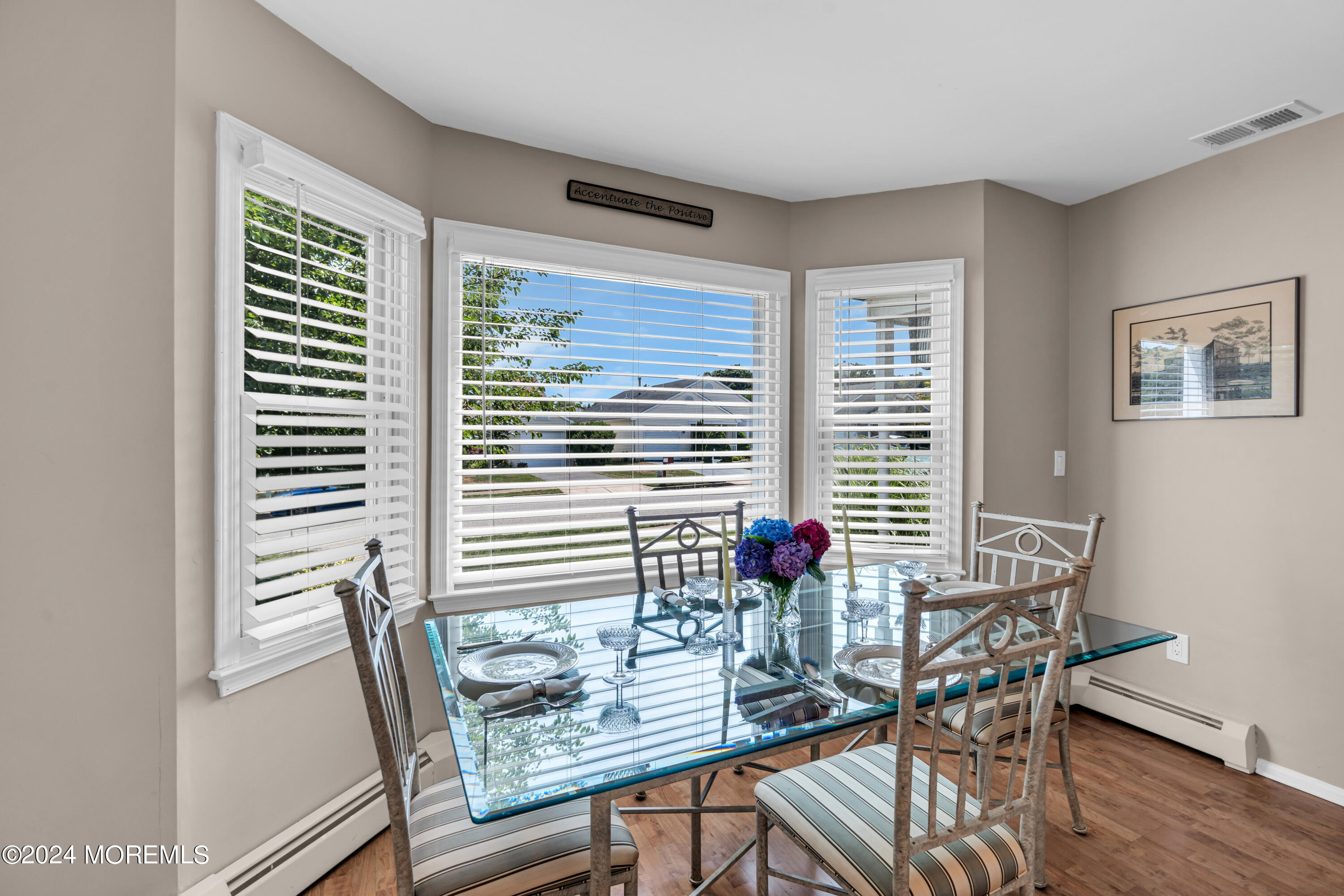 8 Deer Run Lane Brick, NJ 08724 - Photo 12 of 42 a view of a dining room with furniture and wooden floor