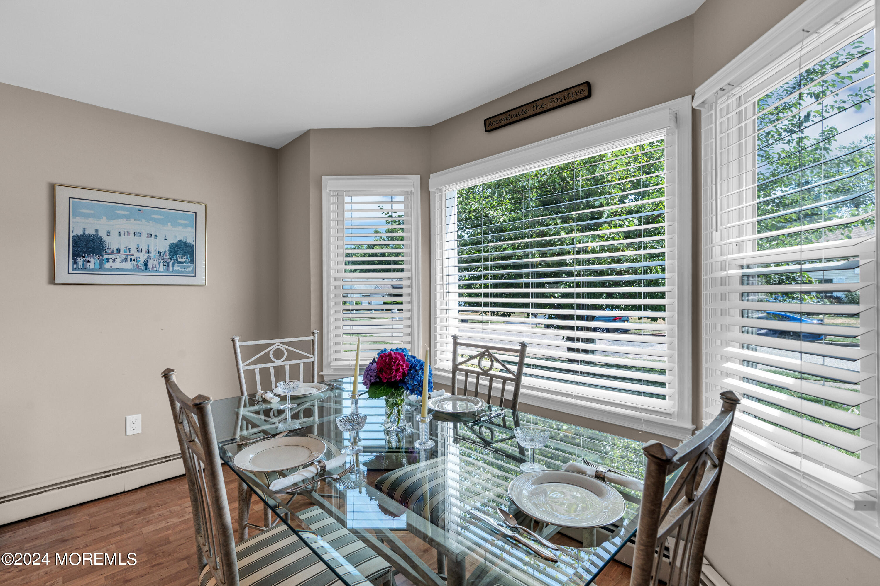 8 Deer Run Lane Brick, NJ 08724 - Photo 13 of 42 a view of a dining room with furniture and wooden floor