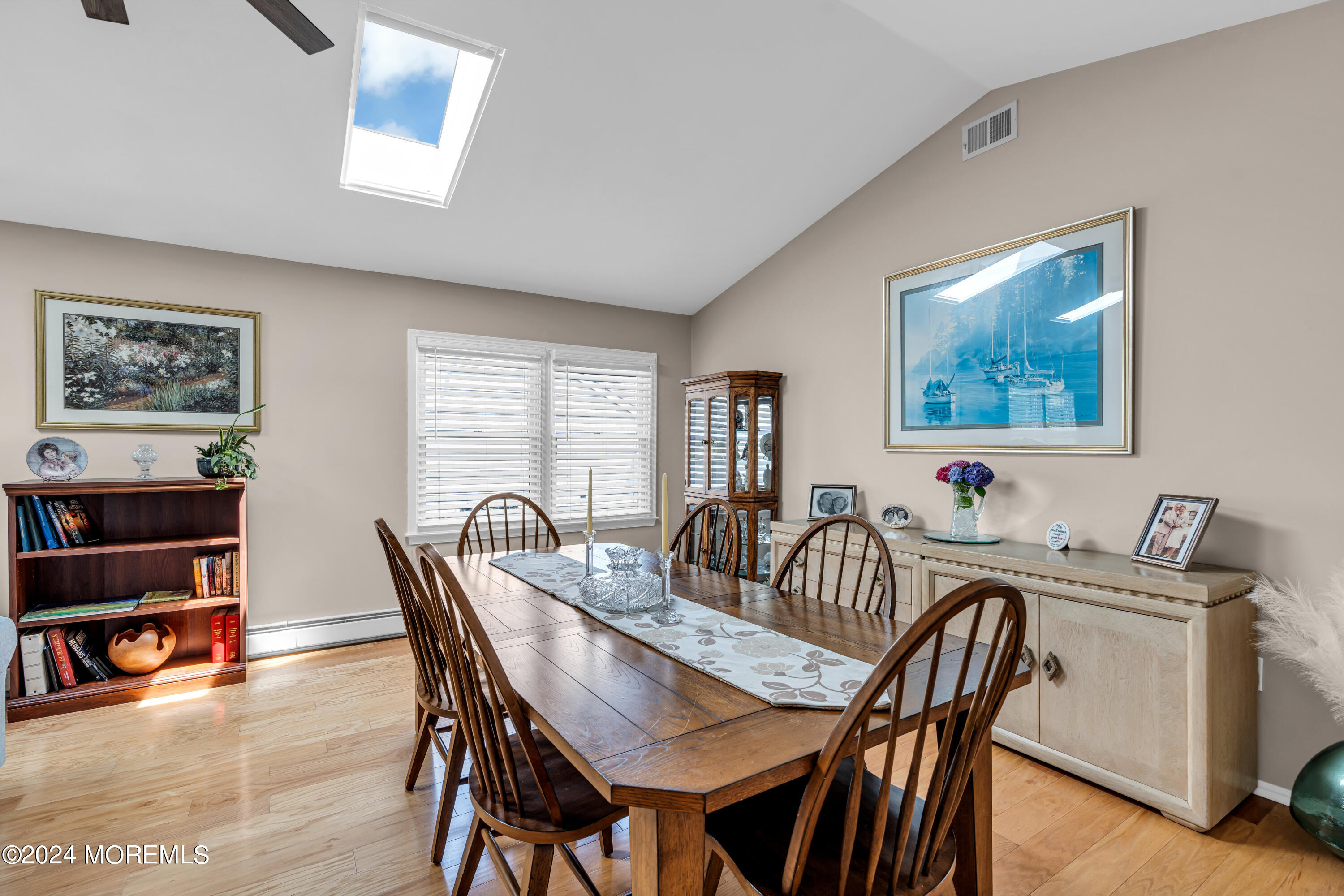 8 Deer Run Lane Brick, NJ 08724 - Photo 18 of 42 a view of a dining room with furniture and a potted plant