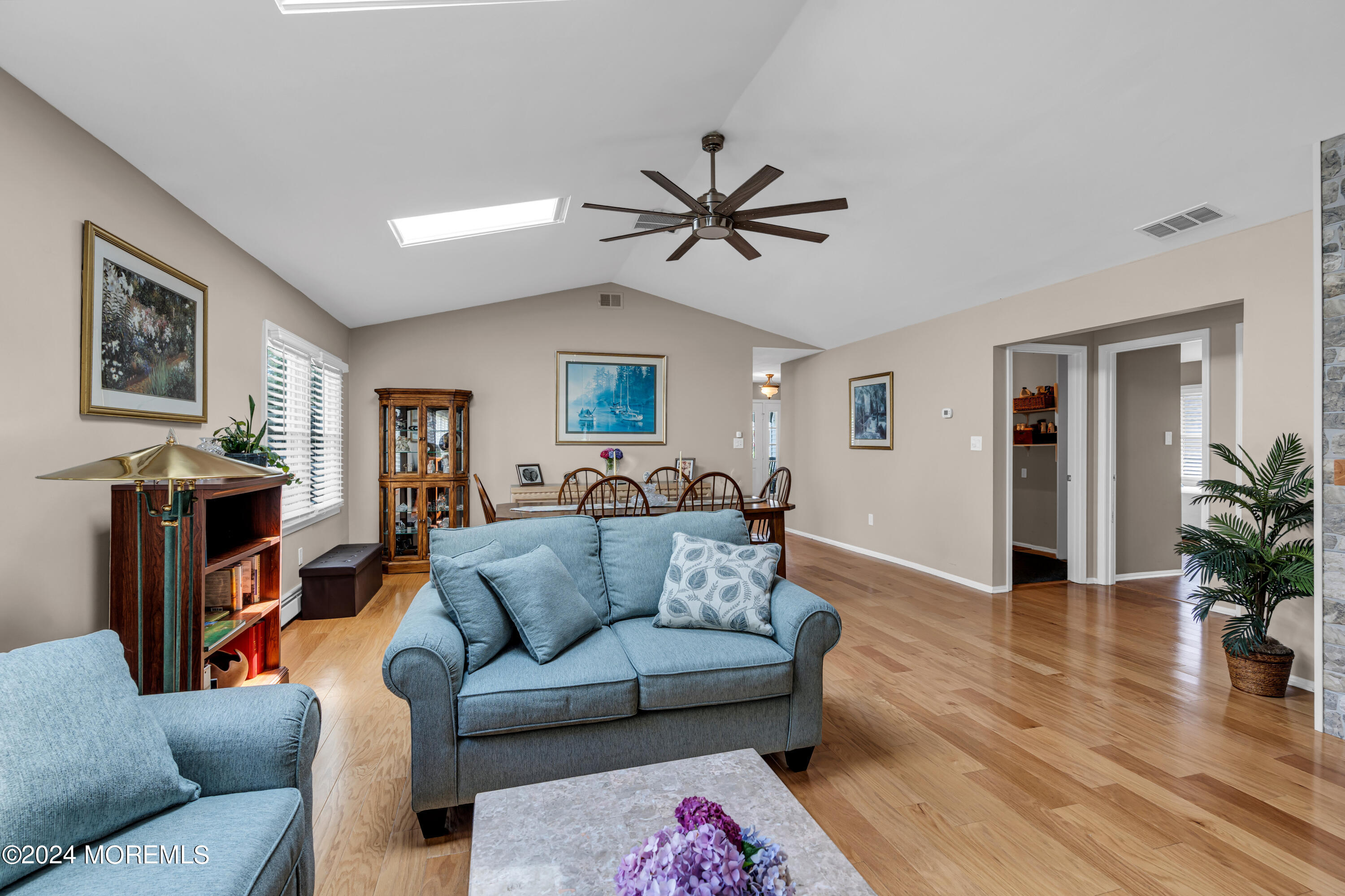 8 Deer Run Lane Brick, NJ 08724 - Photo 20 of 42 a living room with furniture and a flat screen tv