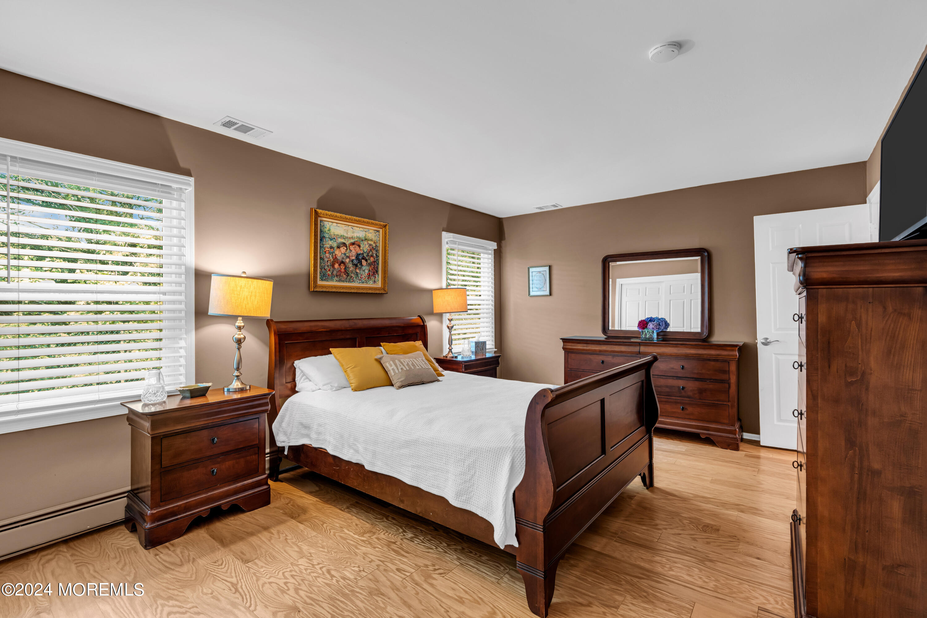 8 Deer Run Lane Brick, NJ 08724 - Photo 24 of 42 a bedroom with a bed and a dresser