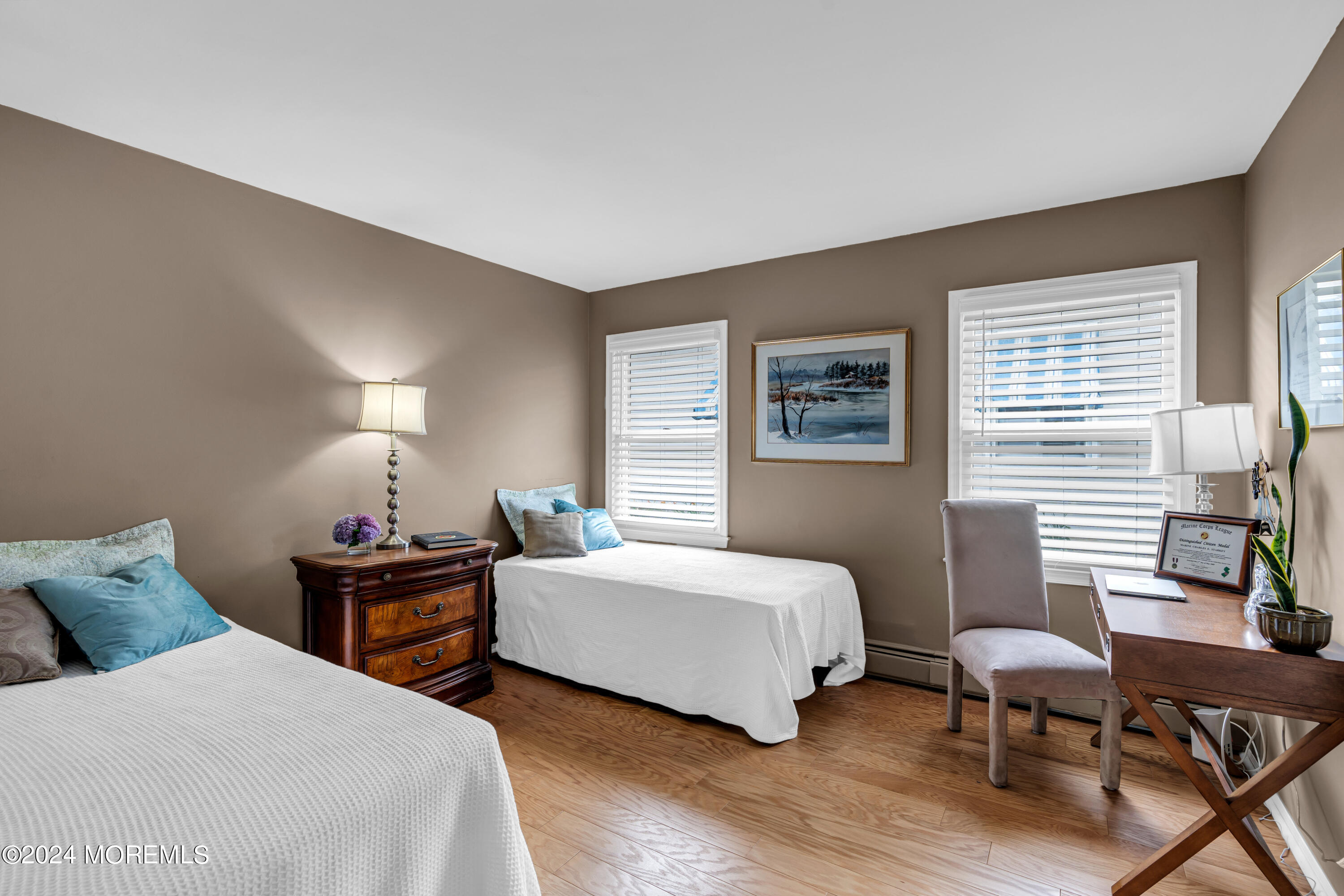 8 Deer Run Lane Brick, NJ 08724 - Photo 28 of 42 a bedroom with two beds and a table with wooden floor