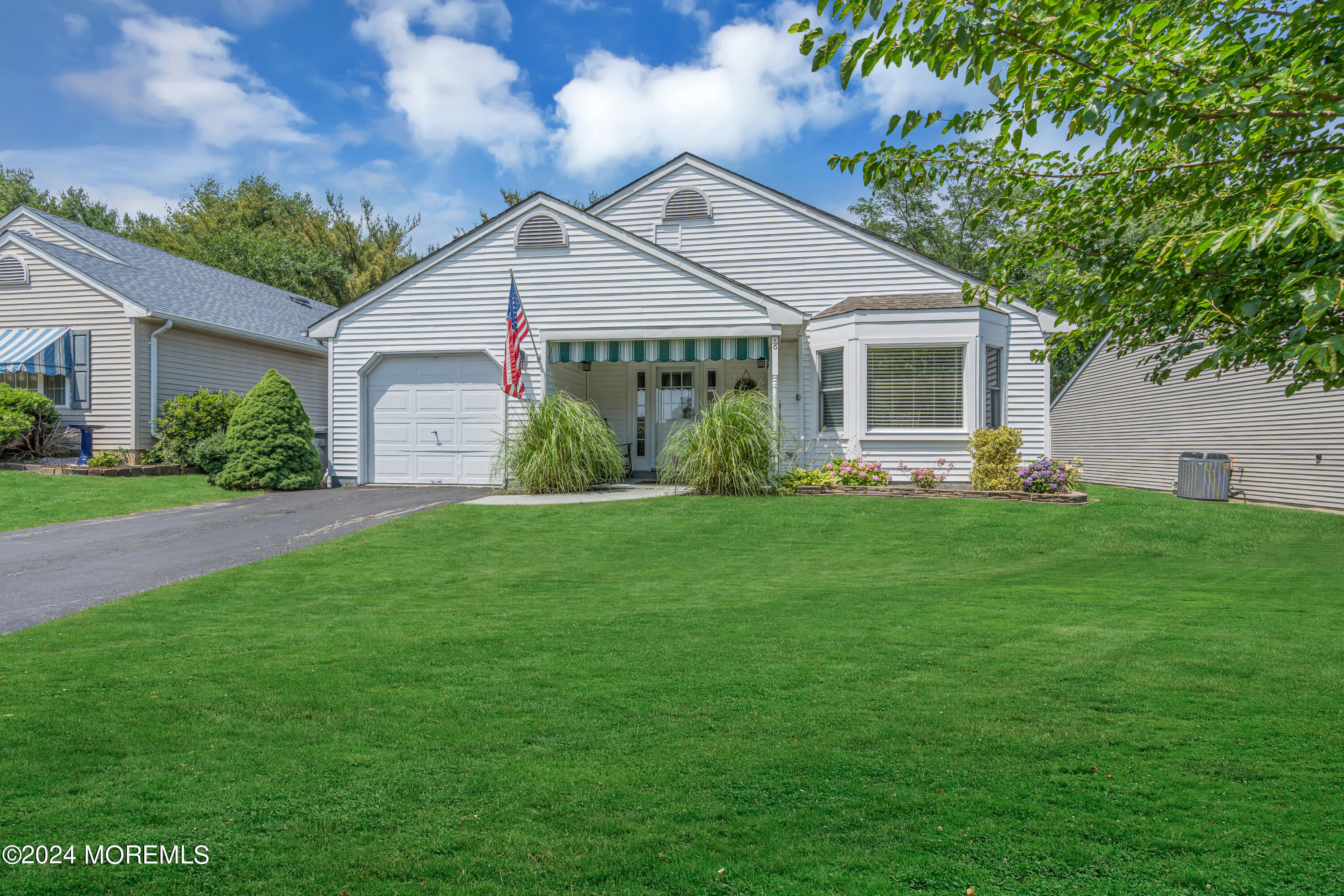 8 Deer Run Lane Brick, NJ 08724 - Photo 3 of 42 a front view of a house with garden