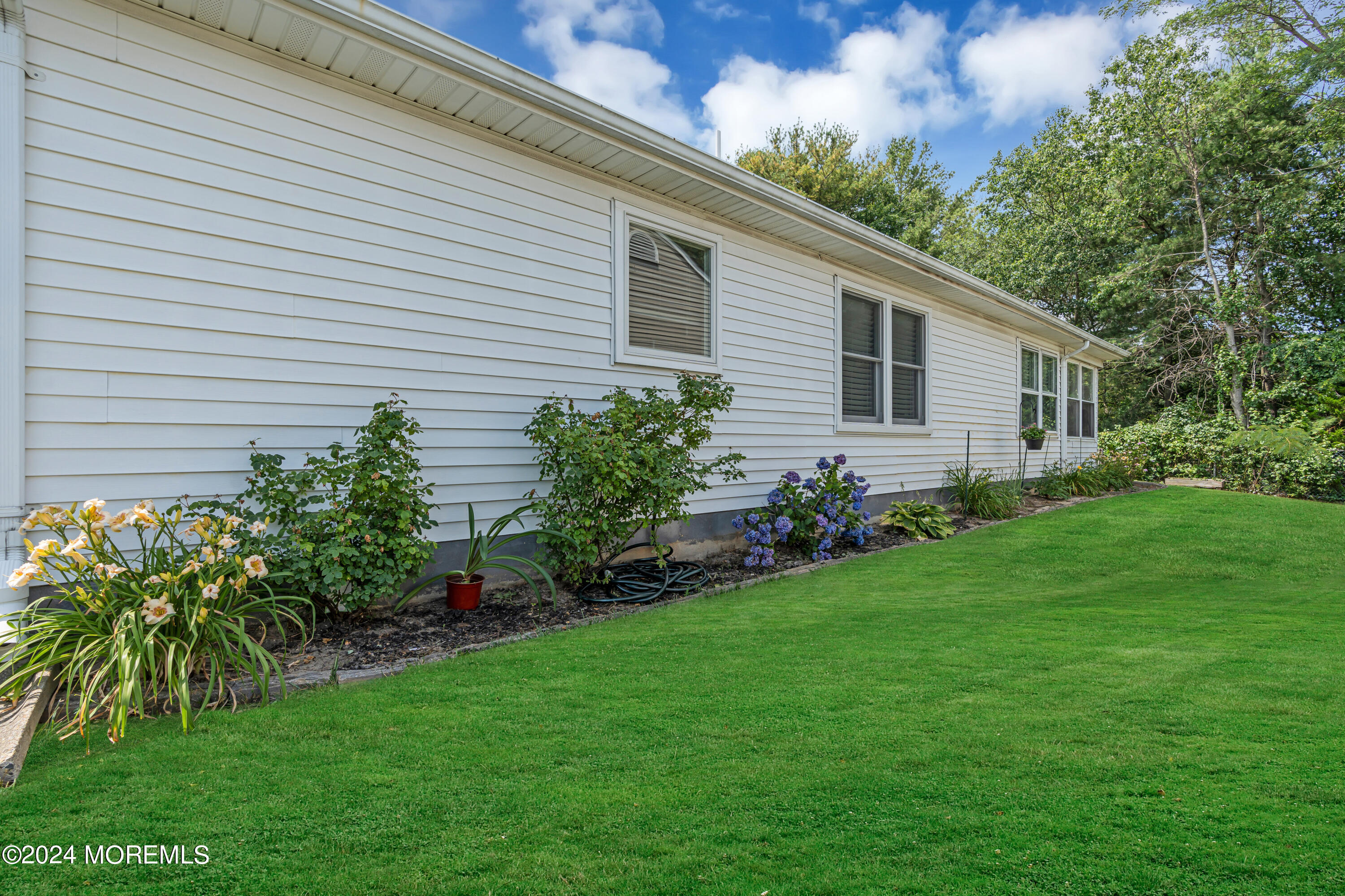 8 Deer Run Lane Brick, NJ 08724 - Photo 34 of 42 a view of a house with a backyard
