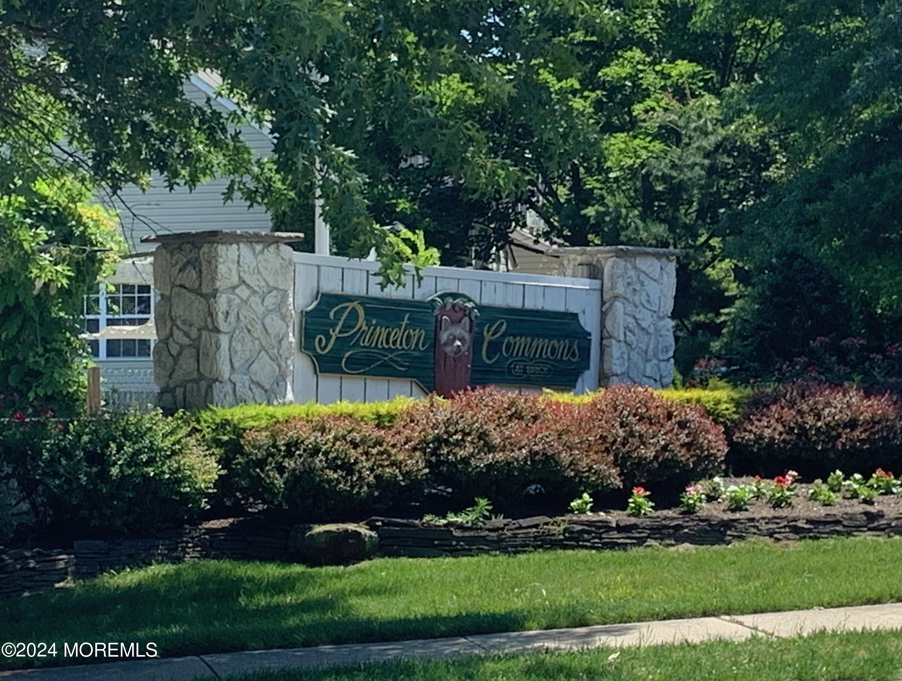 8 Deer Run Lane Brick, NJ 08724 - Photo 38 of 42 a view of a wooden house with a yard and potted plants