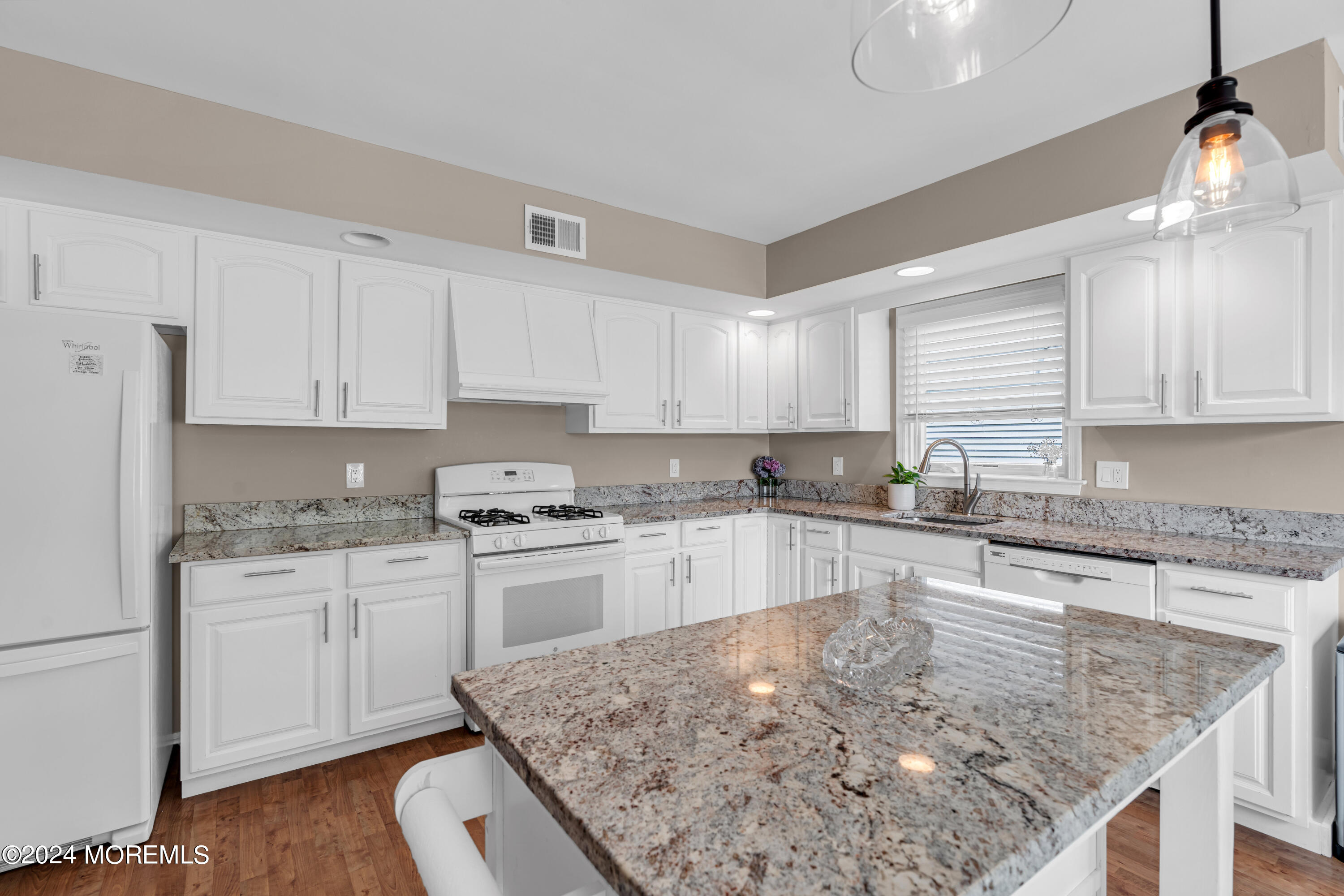 8 Deer Run Lane Brick, NJ 08724 - Photo 9 of 42 a kitchen with stainless steel appliances granite countertop a sink stove and refrigerator
