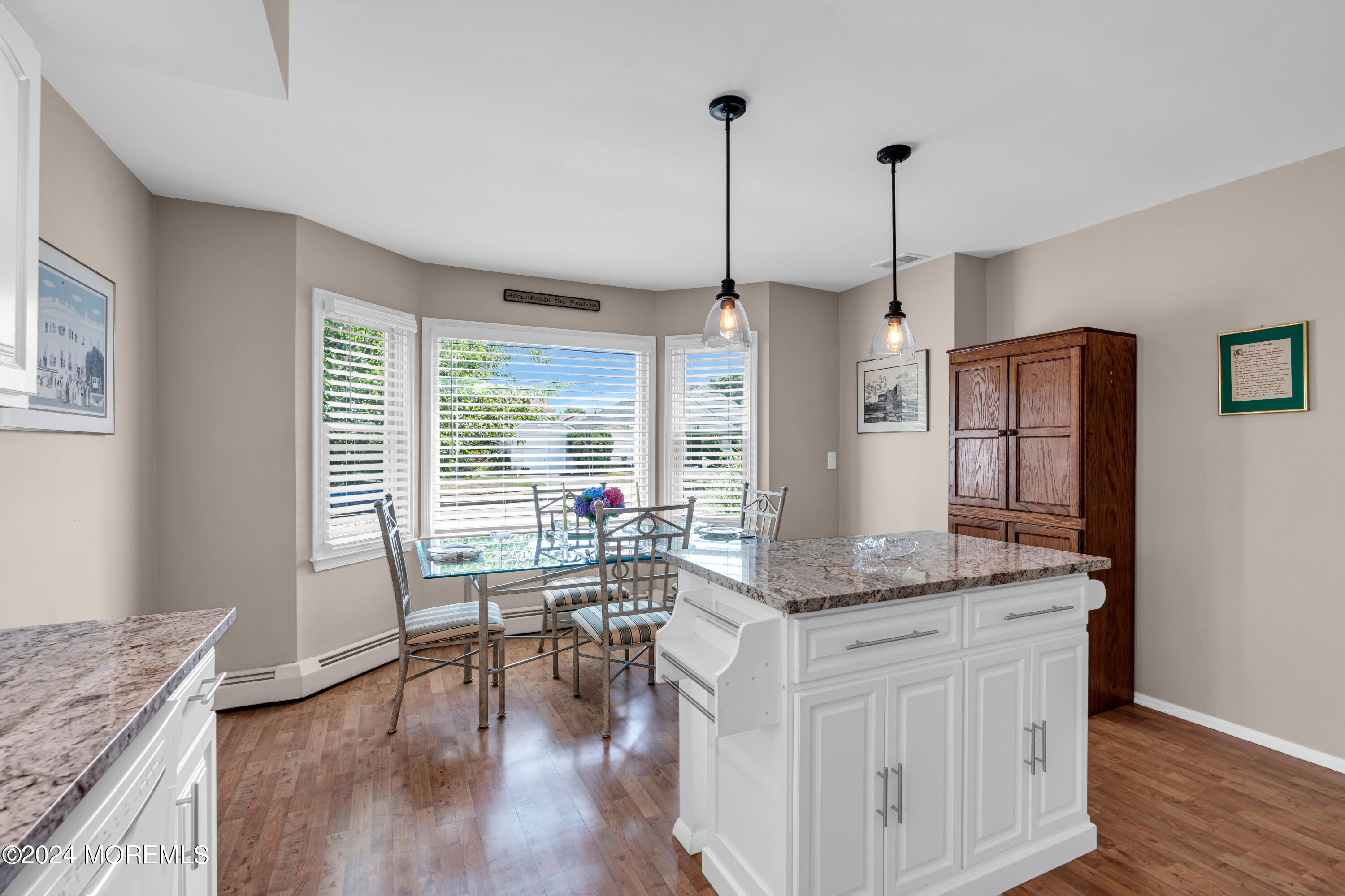 8 Deer Run Lane Brick, NJ 08724 - Photo 10 of 42 a living room with granite countertop furniture a fireplace and a floor to ceiling window