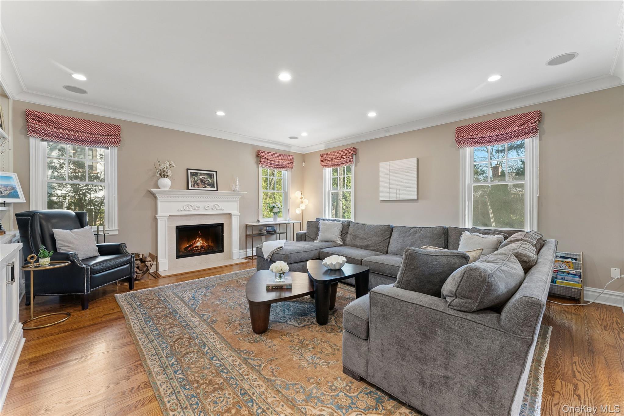33 Wynmor Road Scarsdale, NY 10583 - Photo 11 of 40 Family room with wood burning fireplace