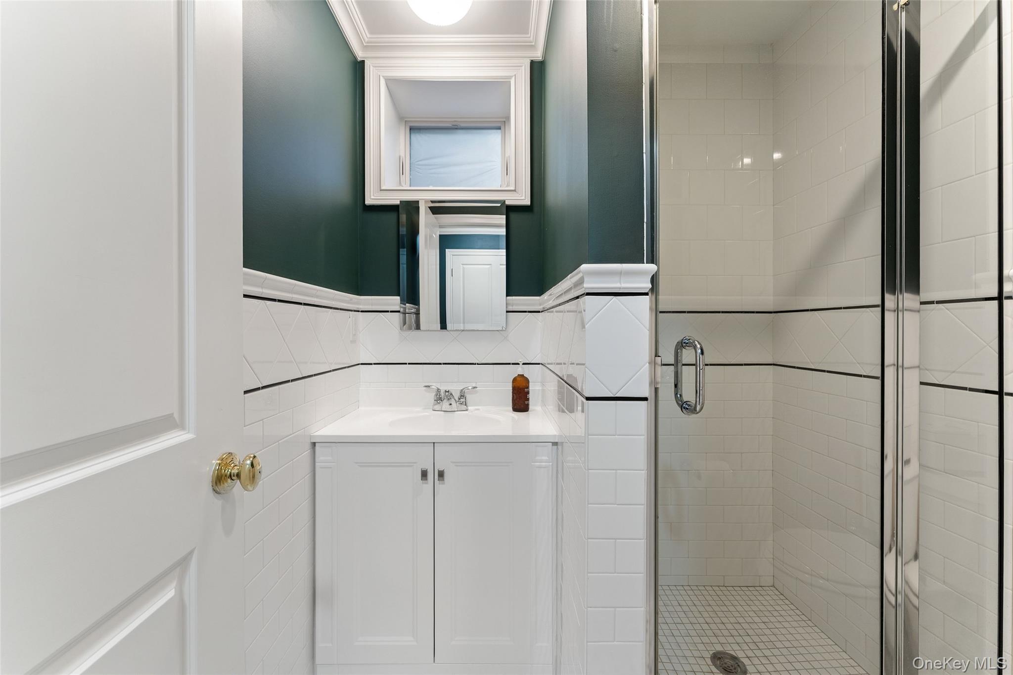 33 Wynmor Road Scarsdale, NY 10583 - Photo 30 of 40 Lower level full bathroom with stall shower