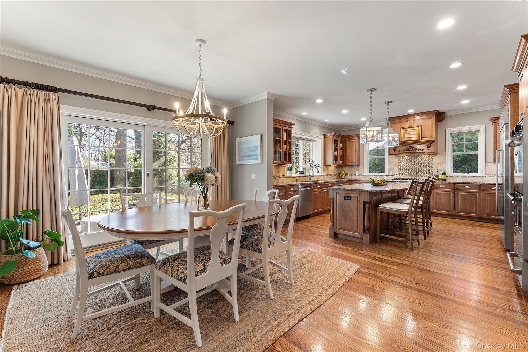 33 Wynmor Road Scarsdale, NY 10583 - Photo 9 of 40 Breakfast area overlooking kitchen and sliders to patio