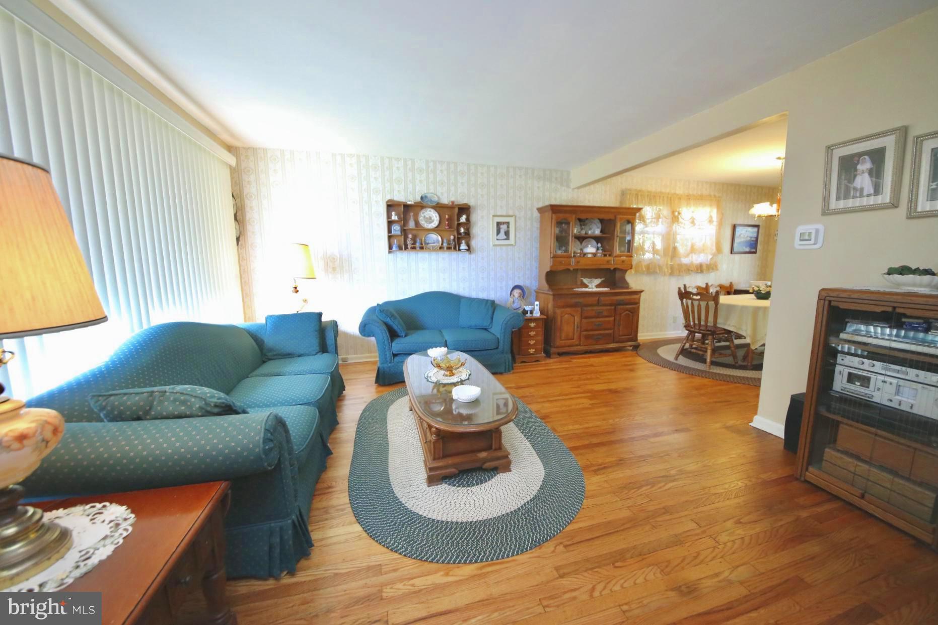 113 Surrey Road Voorhees, NJ 08043 - Photo 3 of 38 Living room with oak hardwood floors