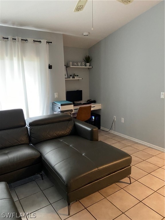 606 Robert Avenue Lehigh Acres, FL 33936 - Photo 14 of 14 a living room with furniture