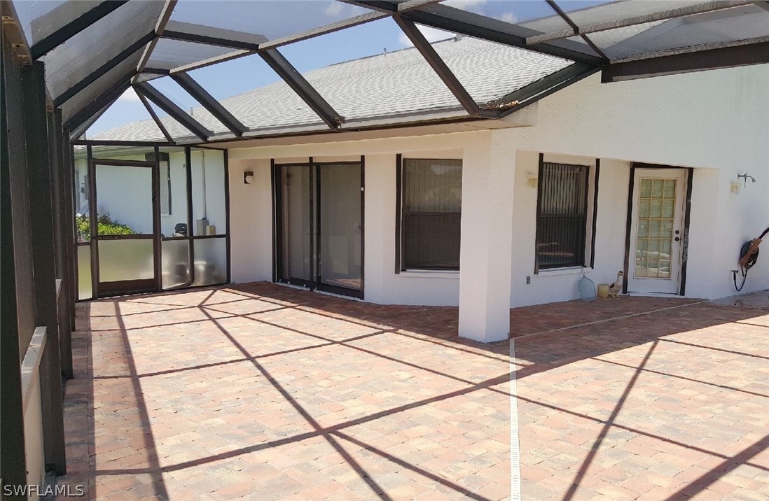 606 Robert Avenue Lehigh Acres, FL 33936 - Photo 7 of 14 a view of a entryway door
