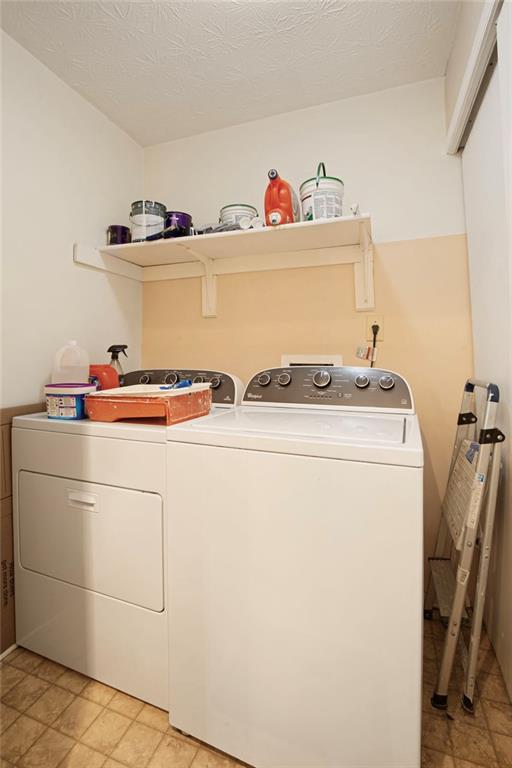 310 Natchez Trace Atlanta, GA 30350 - Photo 27 of 55 a utility room with dryer and washer