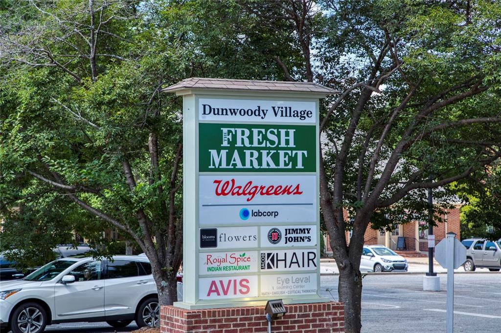 310 Natchez Trace Atlanta, GA 30350 - Photo 49 of 55 a sign on the side of a building