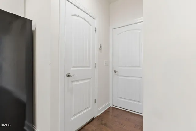 a view of a garage with racks on the wall