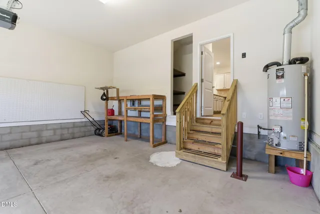 a view of a hallway with staircase