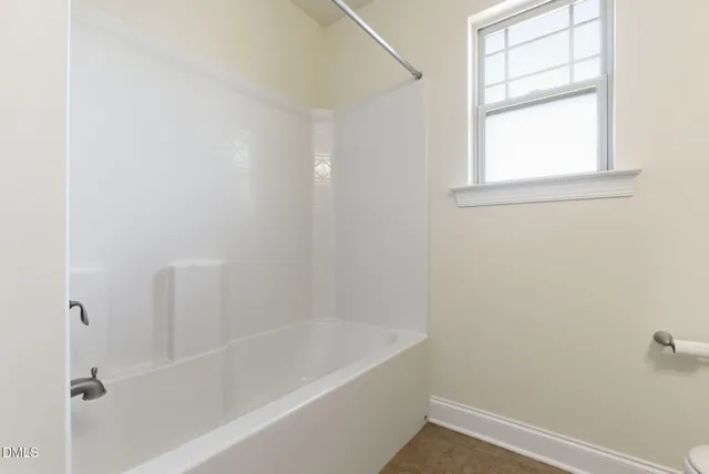 a view of a room with windows