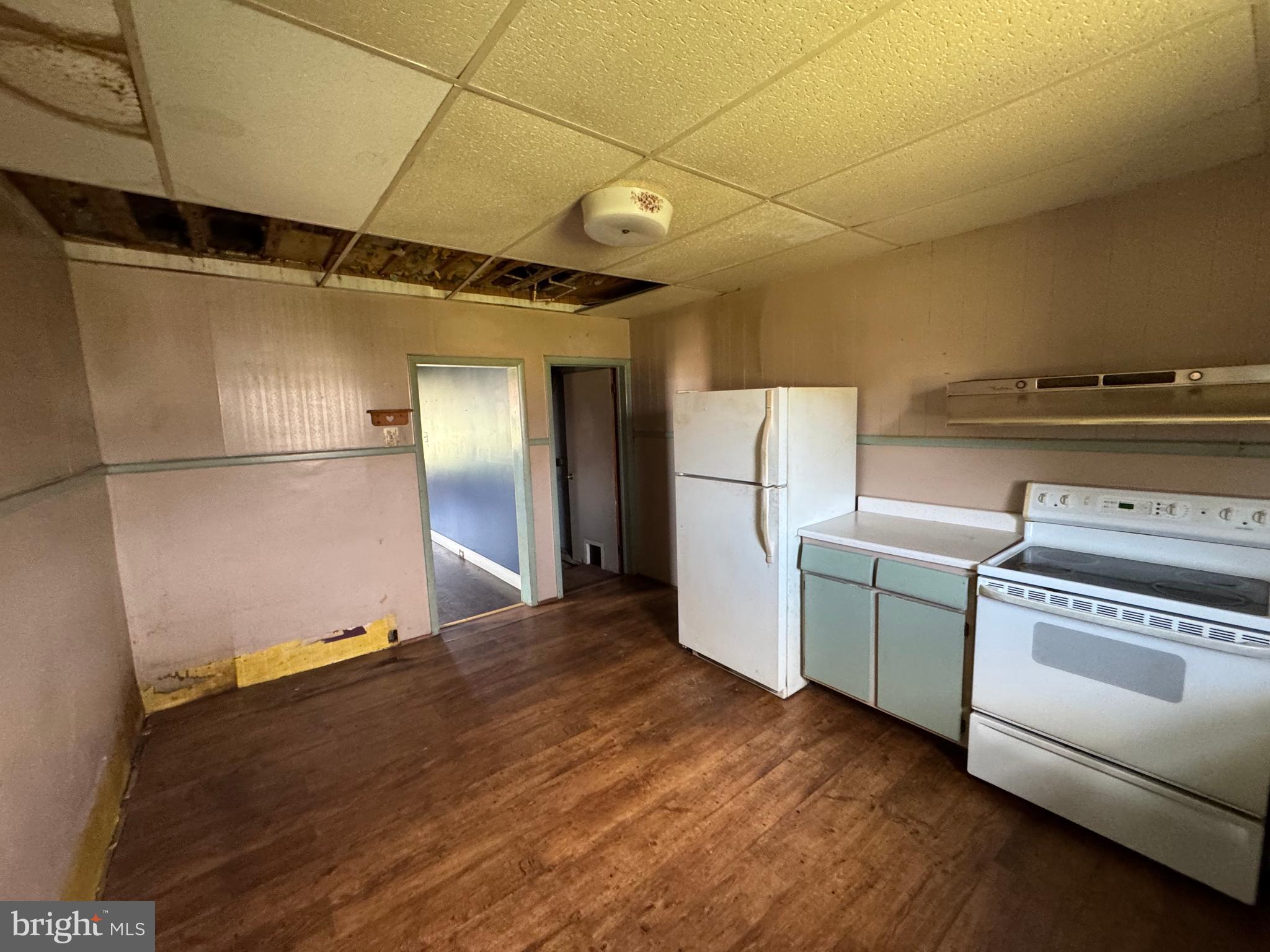 1951 Park Street Dover, PA 17315 - Photo 18 of 38 a kitchen with a refrigerator and a stove top oven