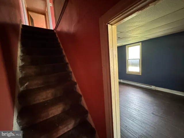 a view of an entryway with staircase