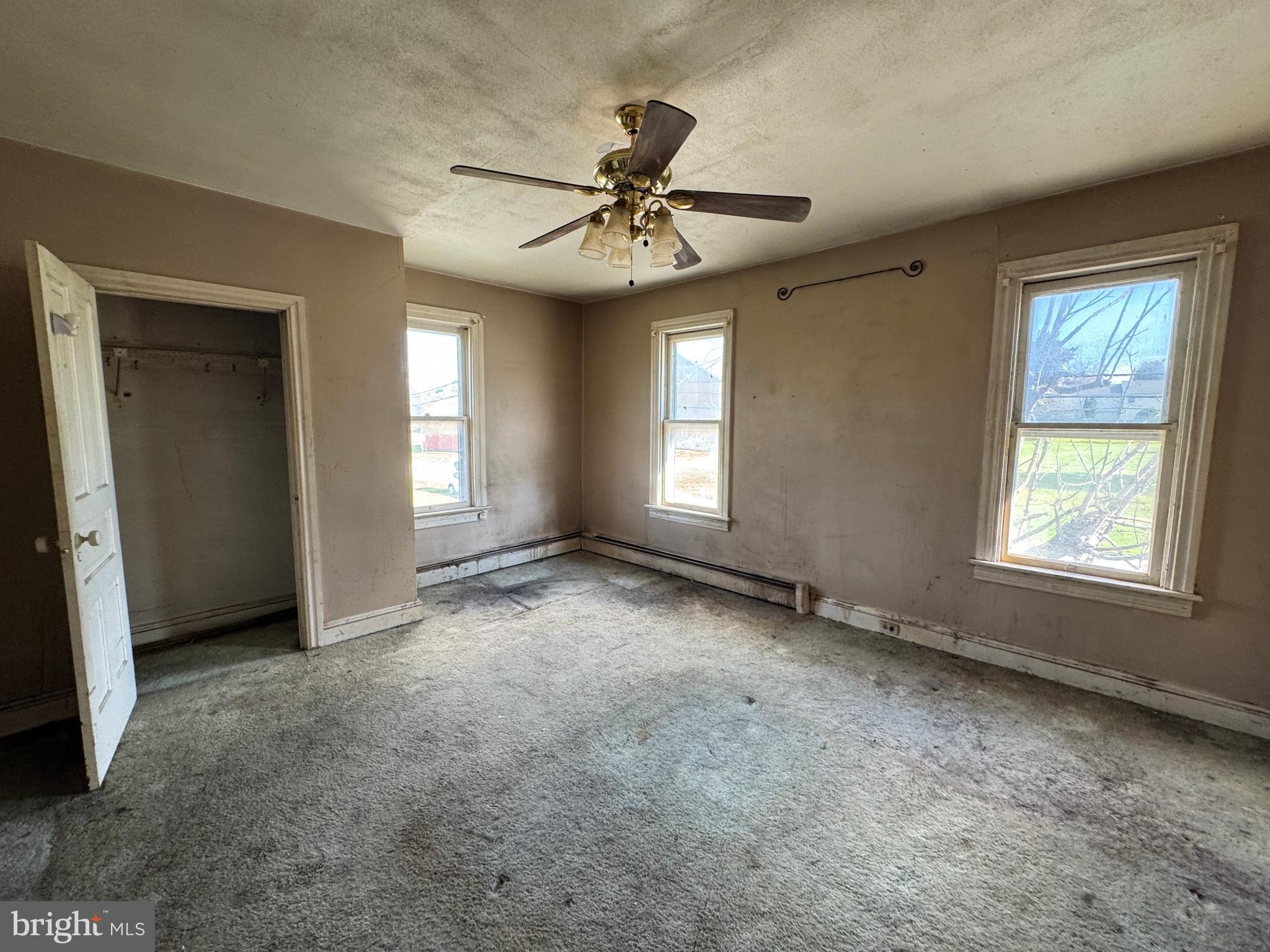 1951 Park Street Dover, PA 17315 - Photo 27 of 38 an empty room with windows and fan