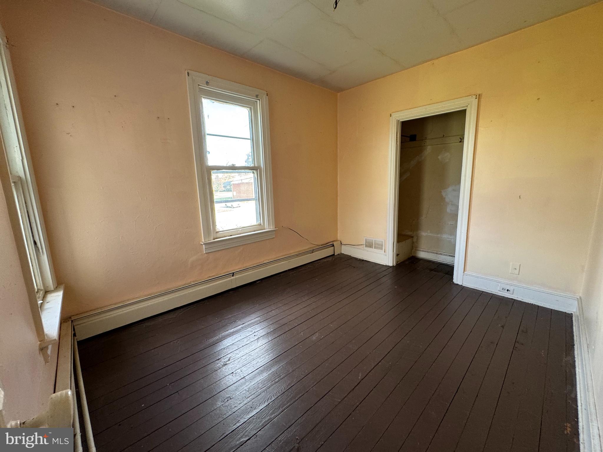 1951 Park Street Dover, PA 17315 - Photo 30 of 38 an empty room with wooden floor and windows